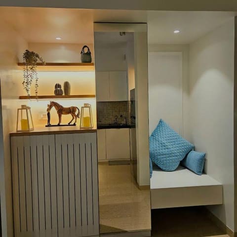 The corner studio, top floor at Lodha Belmondo
